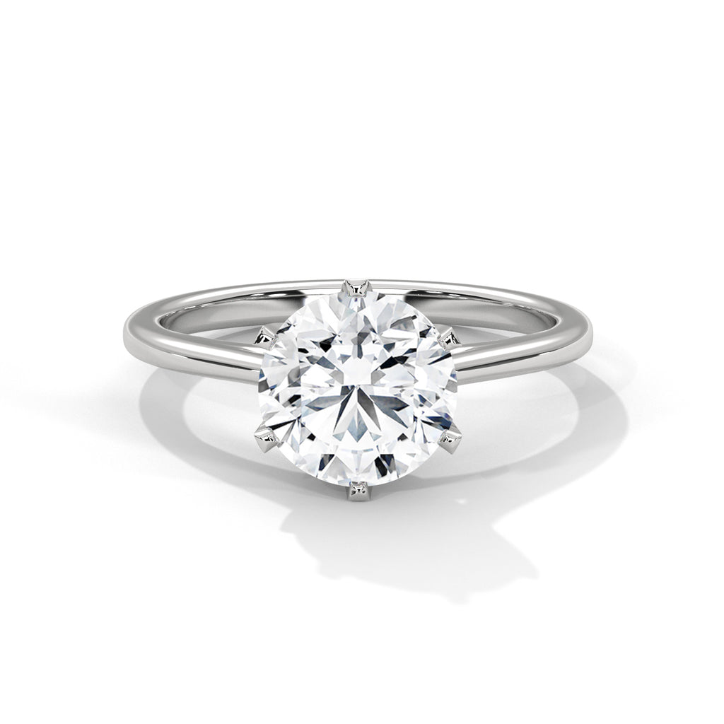 Round cut six prongs Solitaire Ring