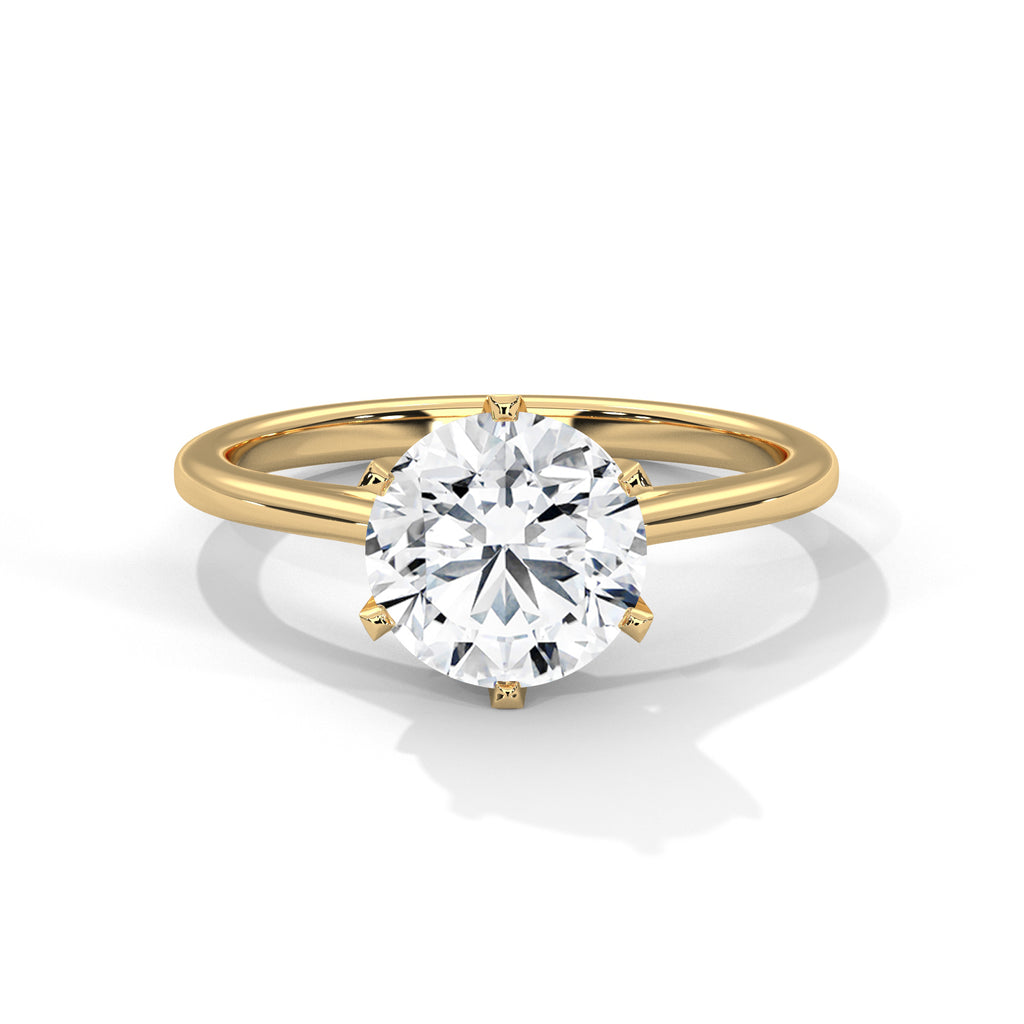 Round cut six prongs Solitaire Ring