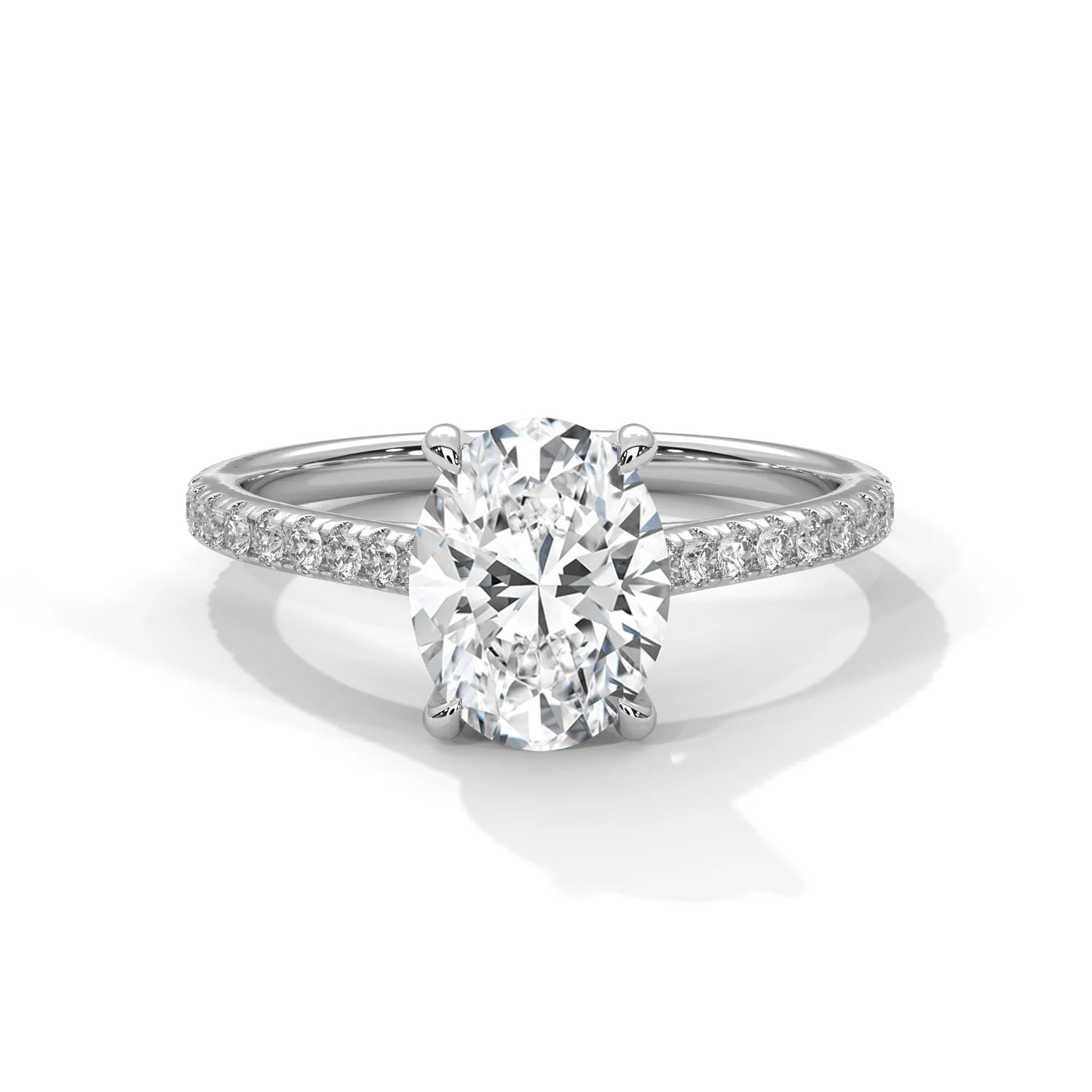 2 Carat, D-E Colour, VVS-VS Clarity, Excellent Cut, Oval Cut Sidestone Ring