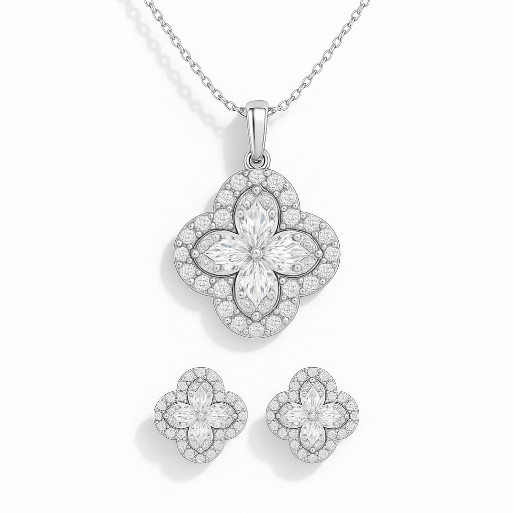 Floral silver jewelry set with necklace and earrings on a white background