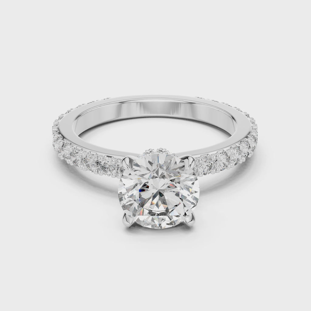 2 Carat to 8 Carat Diavont Round Diamond Ring with sidestones